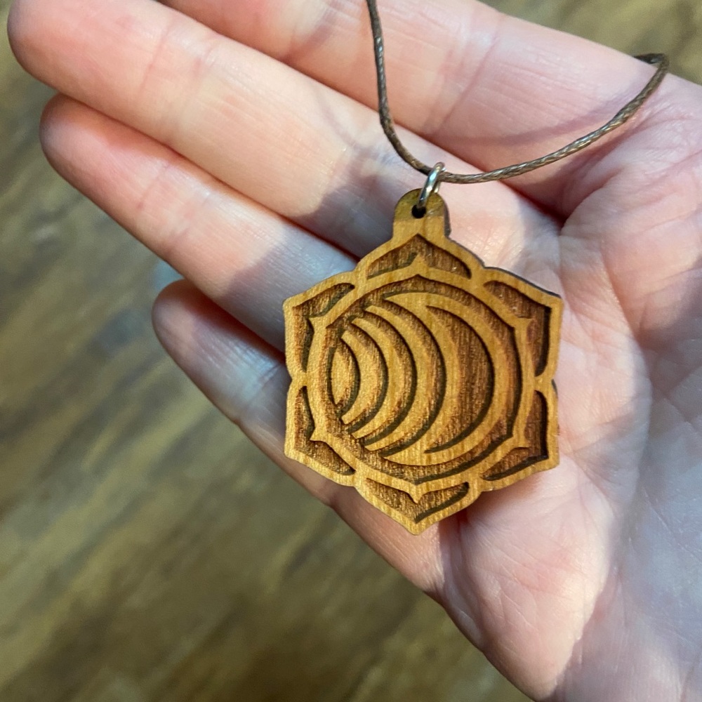 Laser etched pendant